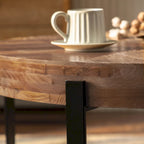 Table basse ronde "Modern Retro Stitching" avec plateau en bois de sapin et piètement croisé noir, pour salon
